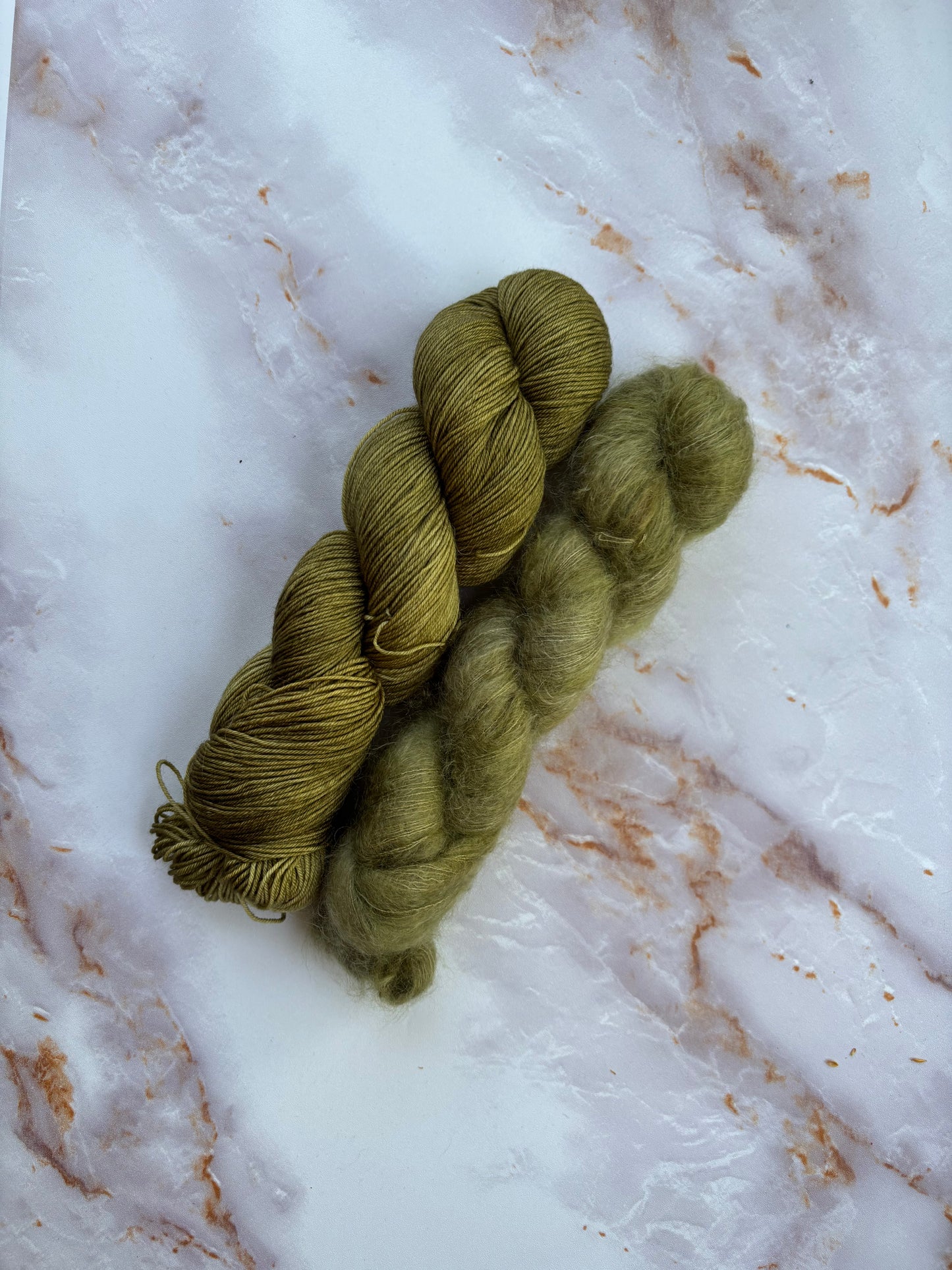 Olive green fingering weight yarn and matching olive green mohair